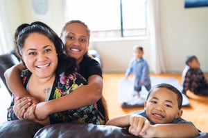 Image of a family smiling